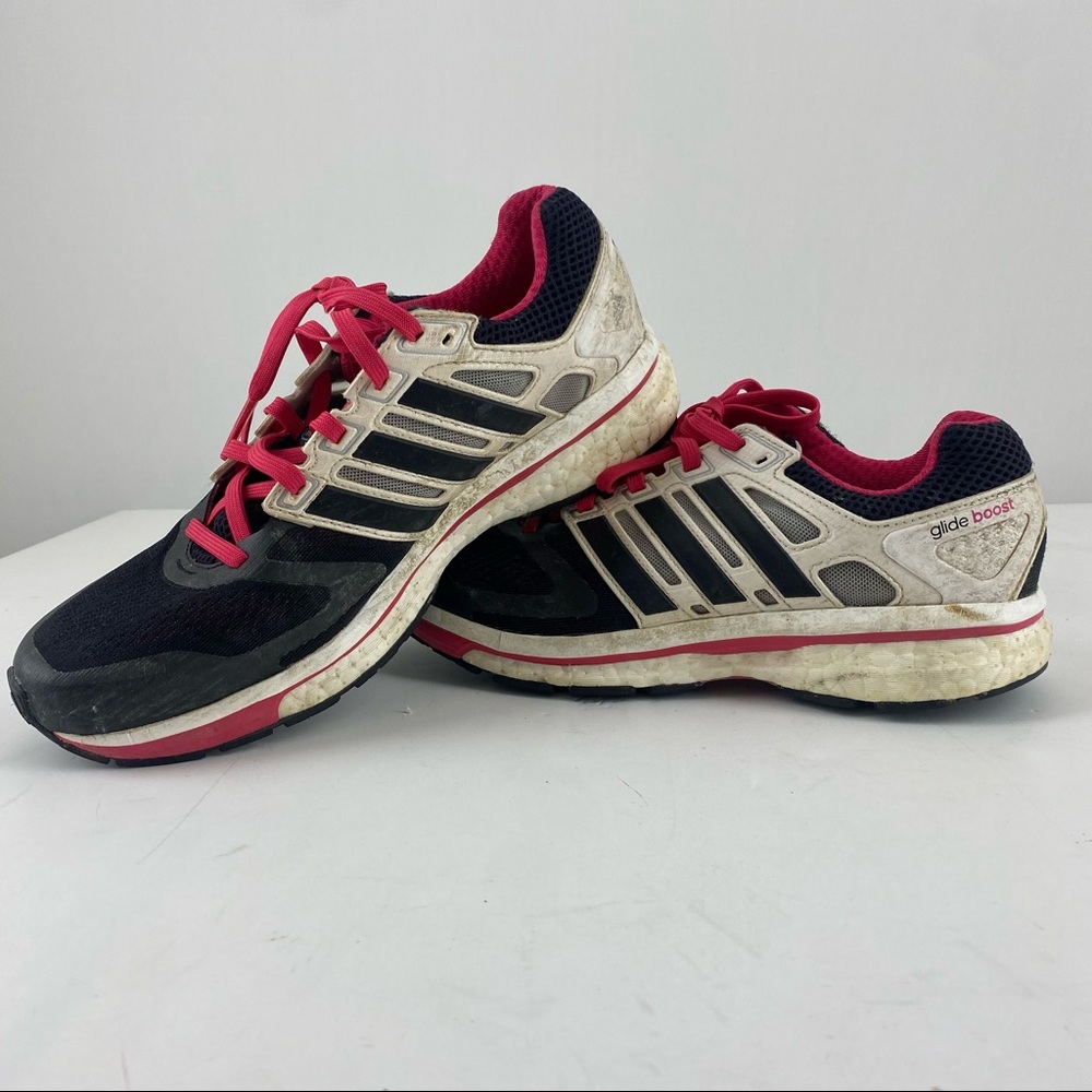 Well Worn Pink Adidas tennis shoes worn gym shoes